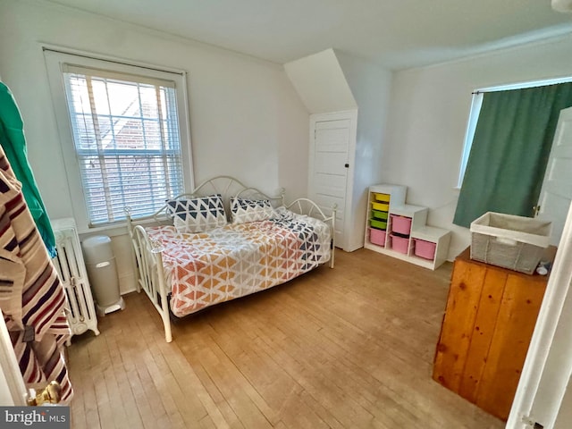 bedroom featuring hardwood / wood-style floors