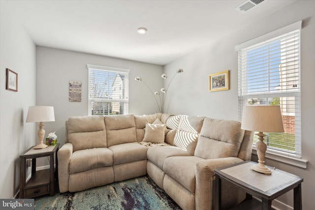 living room with plenty of natural light