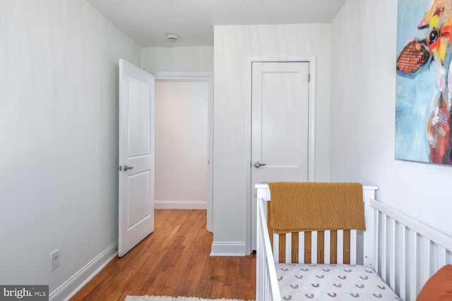 bedroom with light hardwood / wood-style floors