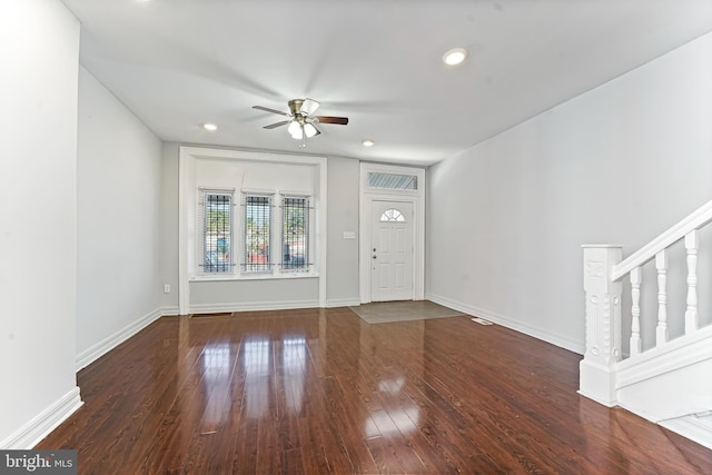 unfurnished living room featuring hardwood / wood-style floors and ceiling fan