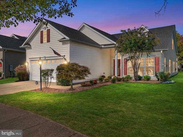 view of front of property with a yard