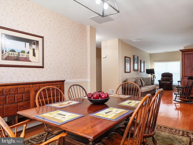 dining area featuring hardwood / wood-style floors