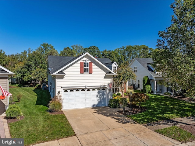 front facade featuring a front yard and a garage