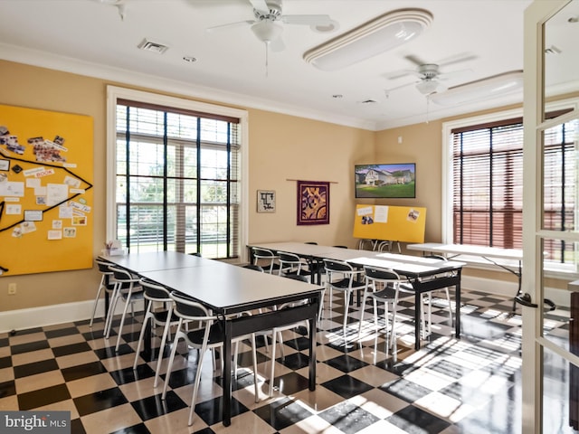 recreation room with crown molding and ceiling fan