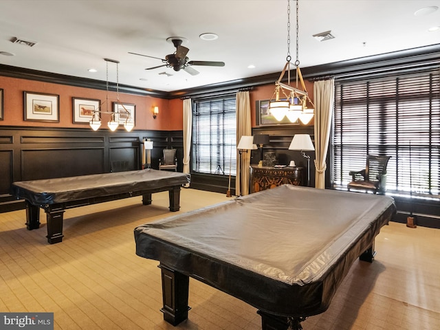 recreation room featuring ceiling fan, a healthy amount of sunlight, crown molding, and billiards