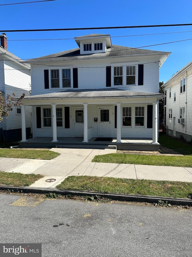 view of front of property featuring covered porch