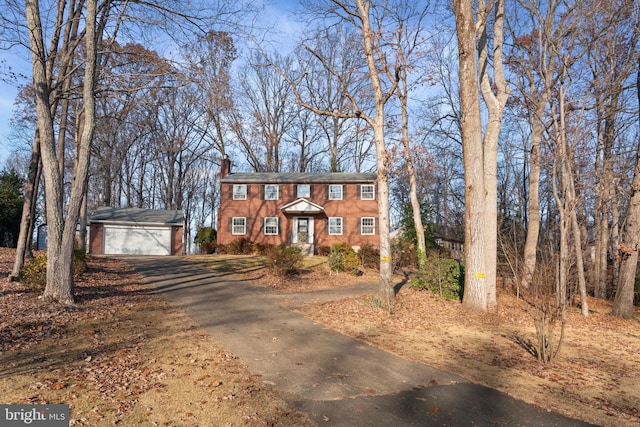 view of front of house featuring an outbuilding and a garage