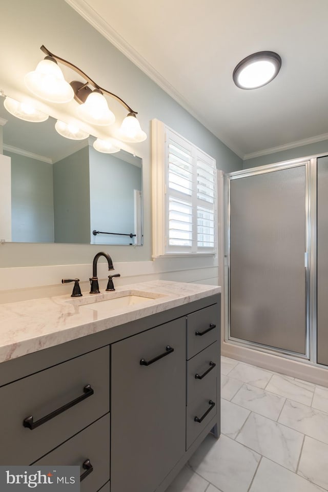 bathroom featuring vanity, crown molding, and an enclosed shower