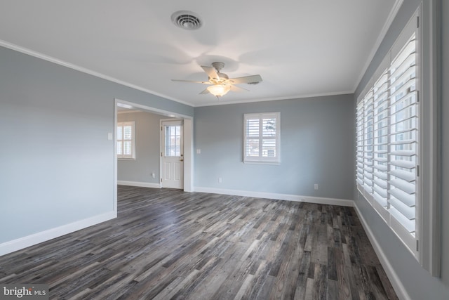 unfurnished room featuring ceiling fan, ornamental molding, dark hardwood / wood-style flooring, and plenty of natural light