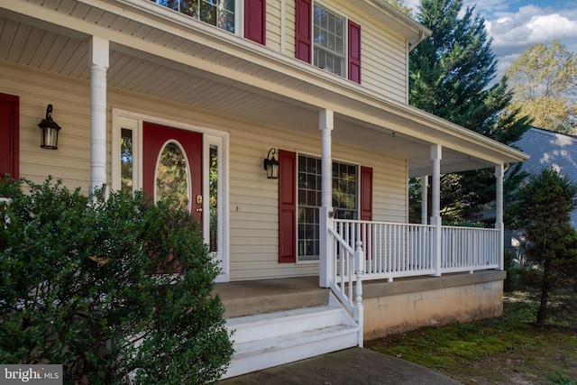 entrance to property with covered porch