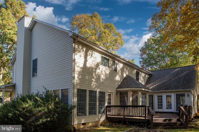 rear view of house with a deck