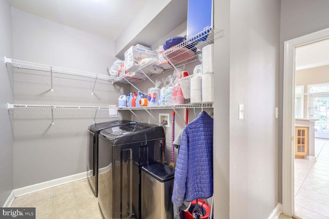 laundry room with separate washer and dryer