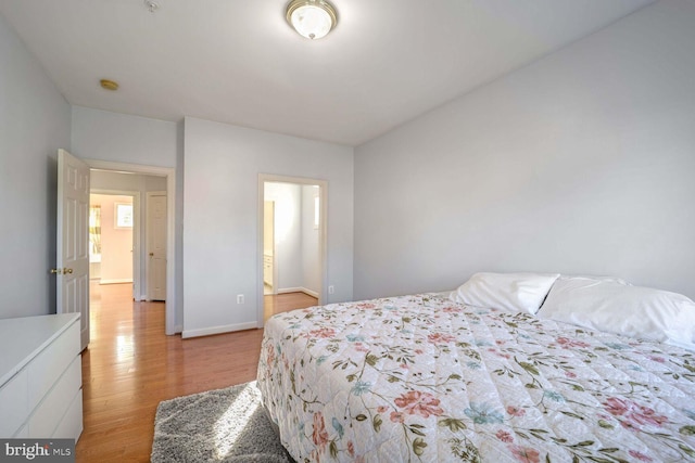 bedroom with light hardwood / wood-style floors