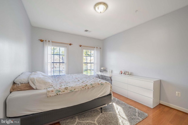 bedroom featuring light wood-type flooring