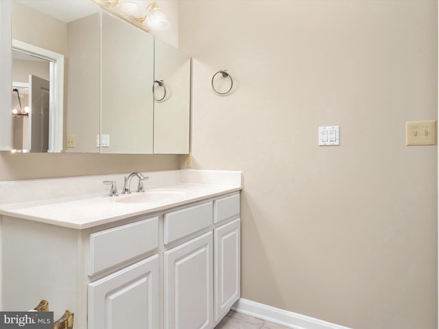 bathroom with vanity and tile patterned floors