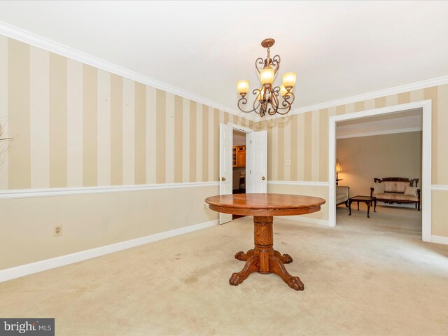 carpeted dining area featuring ornamental molding and a notable chandelier