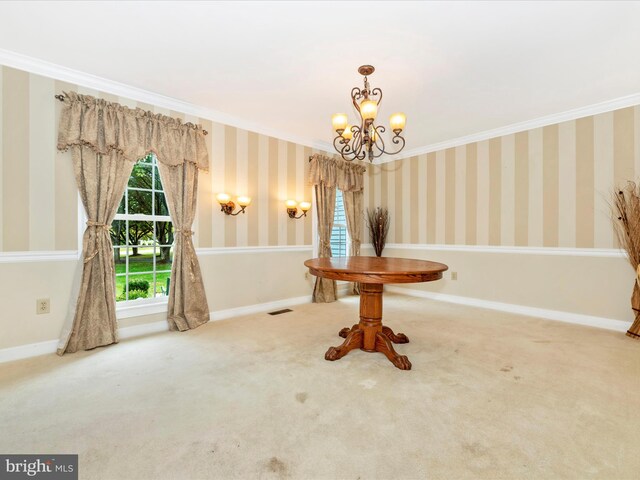 interior space with a notable chandelier, ornamental molding, and carpet