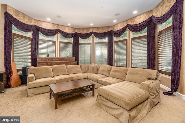 carpeted living room featuring a wealth of natural light