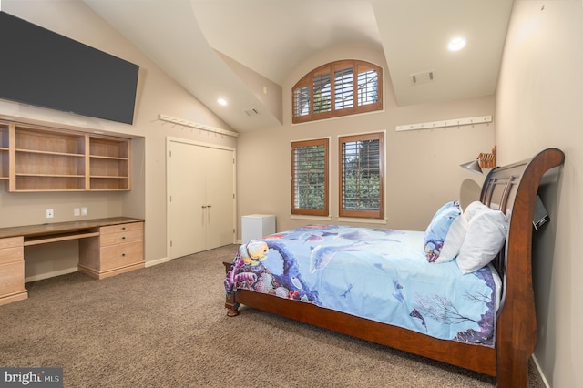 carpeted bedroom featuring high vaulted ceiling and built in desk