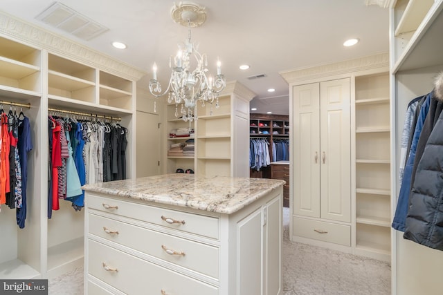 spacious closet with light colored carpet