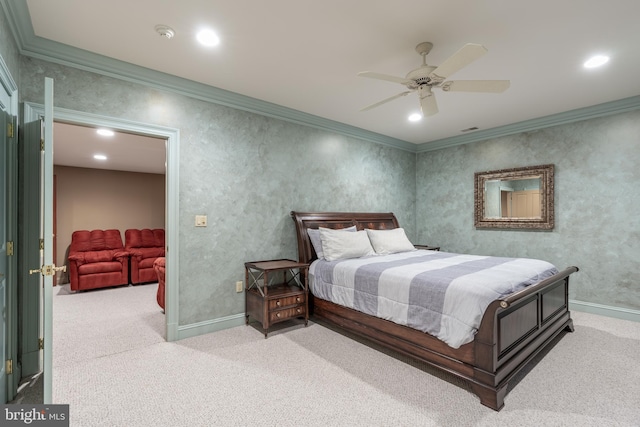 bedroom with ornamental molding, ceiling fan, and light colored carpet