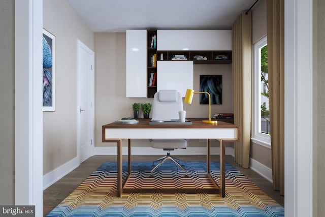 home office featuring wood finished floors and baseboards