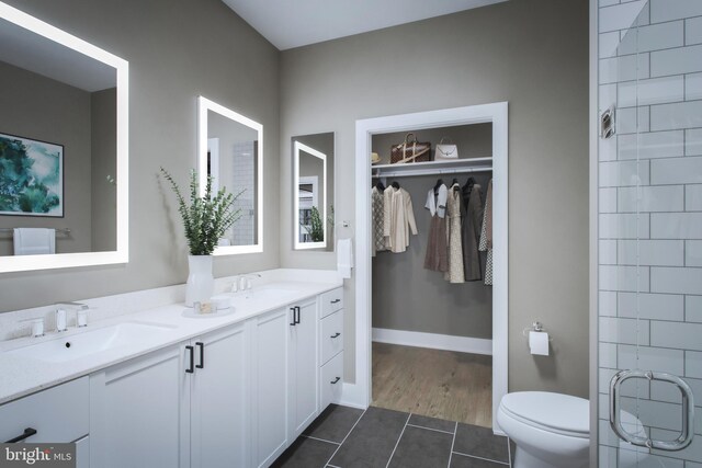 bathroom featuring hardwood / wood-style flooring, vanity, and toilet