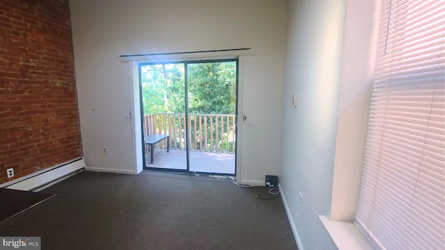 empty room featuring a baseboard radiator