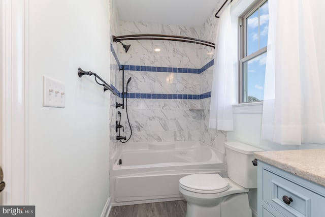 full bathroom featuring vanity, toilet, shower / bath combo with shower curtain, and hardwood / wood-style floors