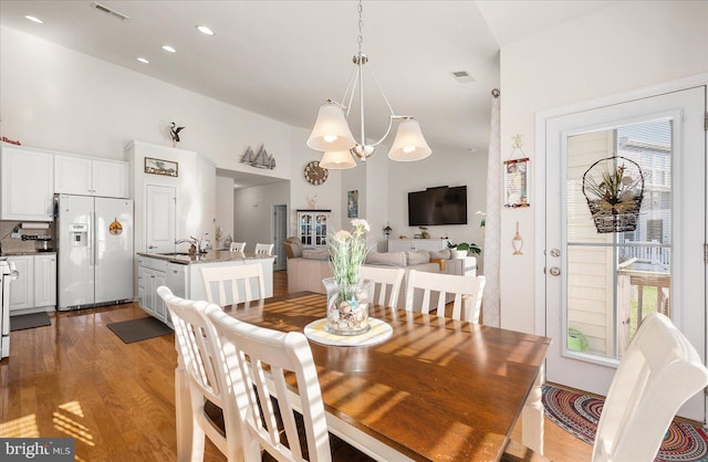 36865 Herring Way, Selbyville, DE 19975 - dining room featuring high vaulted ceiling, light wood-type flooring, a chandelier, and recessed lighting