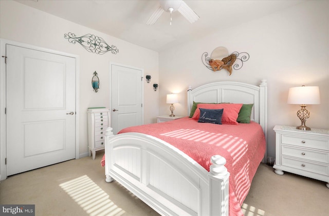 carpeted bedroom featuring ceiling fan