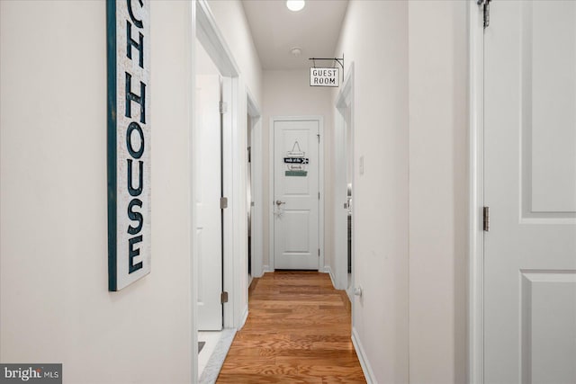 corridor featuring light hardwood / wood-style flooring