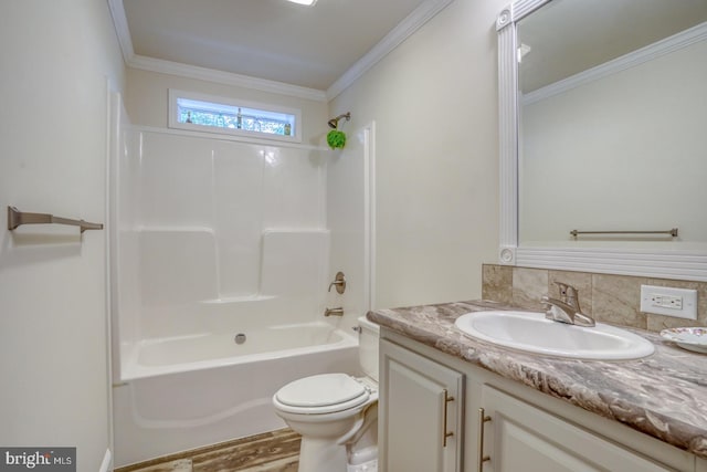 full bathroom featuring hardwood / wood-style flooring, toilet, vanity, crown molding, and shower / bath combination