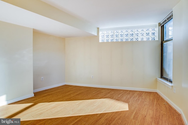 spare room featuring hardwood / wood-style flooring