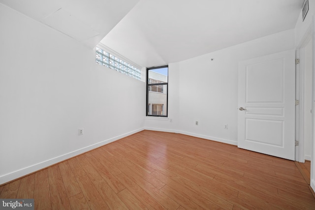 unfurnished room featuring light hardwood / wood-style flooring