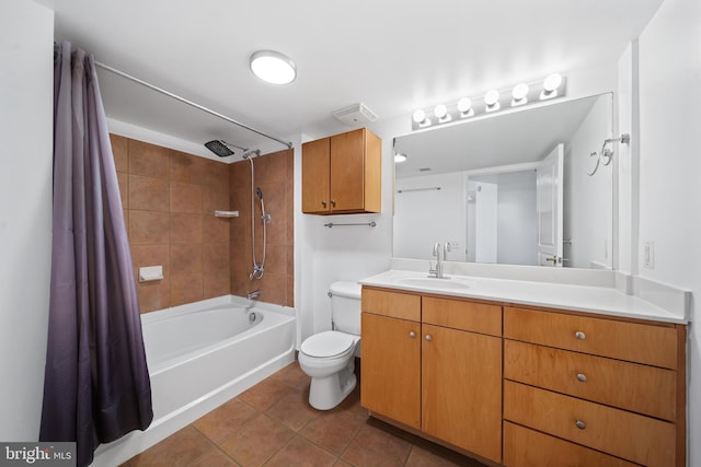 full bathroom featuring toilet, shower / tub combo with curtain, vanity, and tile patterned floors