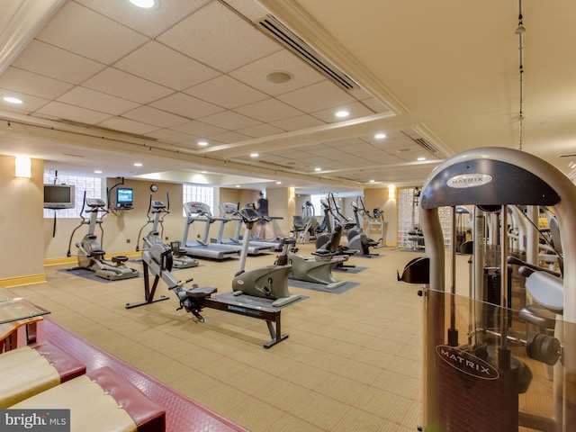 gym featuring a paneled ceiling