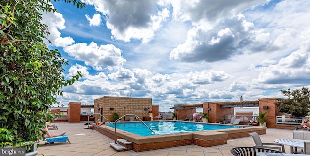 view of pool with a patio area