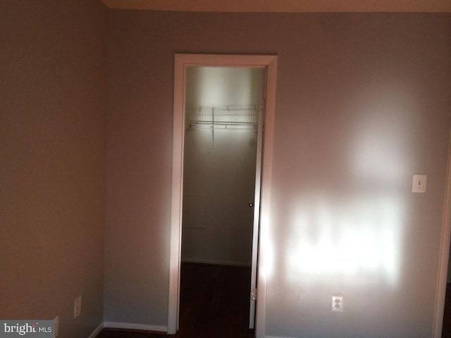 unfurnished bedroom featuring a closet