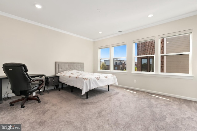 carpeted bedroom with ornamental molding