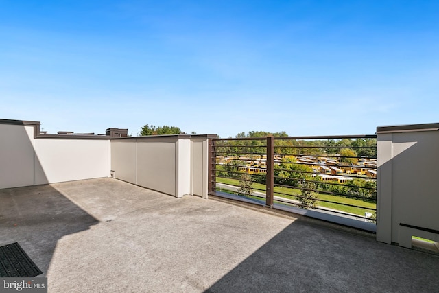 view of patio / terrace with a balcony