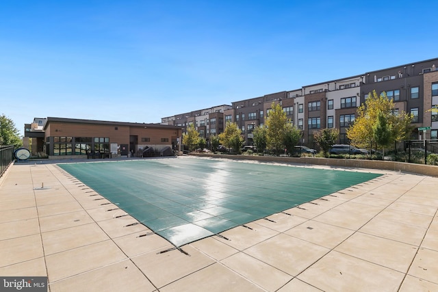 view of pool featuring a patio area