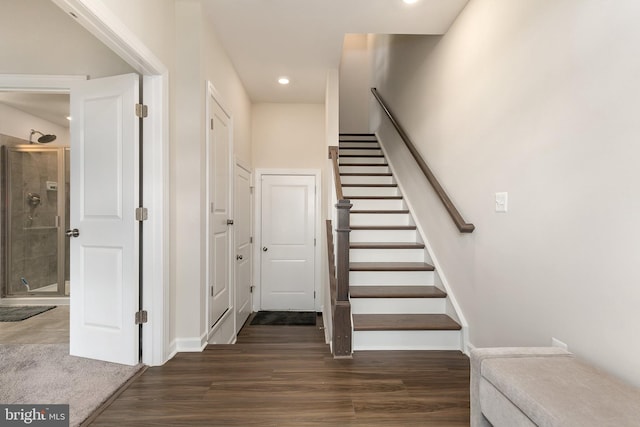 stairway featuring hardwood / wood-style flooring