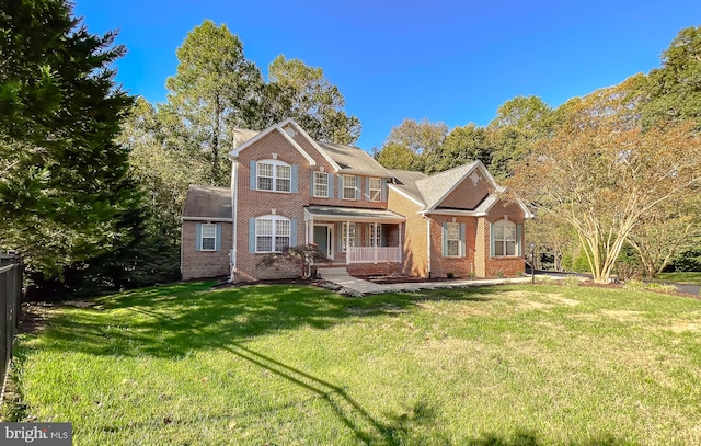 view of front of home with a front lawn