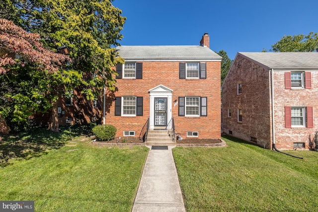 view of front of house with a front yard