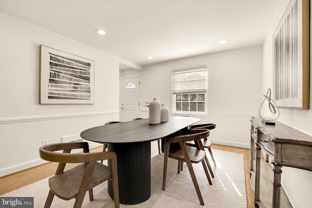 dining room with light wood-type flooring