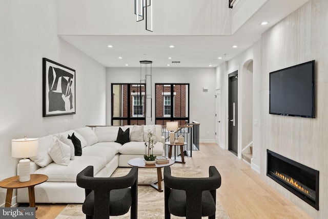 living room featuring light wood-type flooring