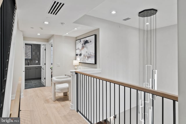 hallway featuring light wood-type flooring