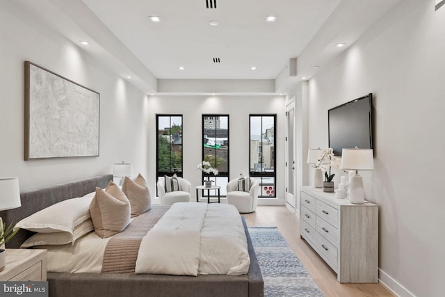 bedroom featuring light hardwood / wood-style floors