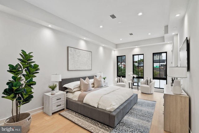 bedroom featuring light wood-type flooring